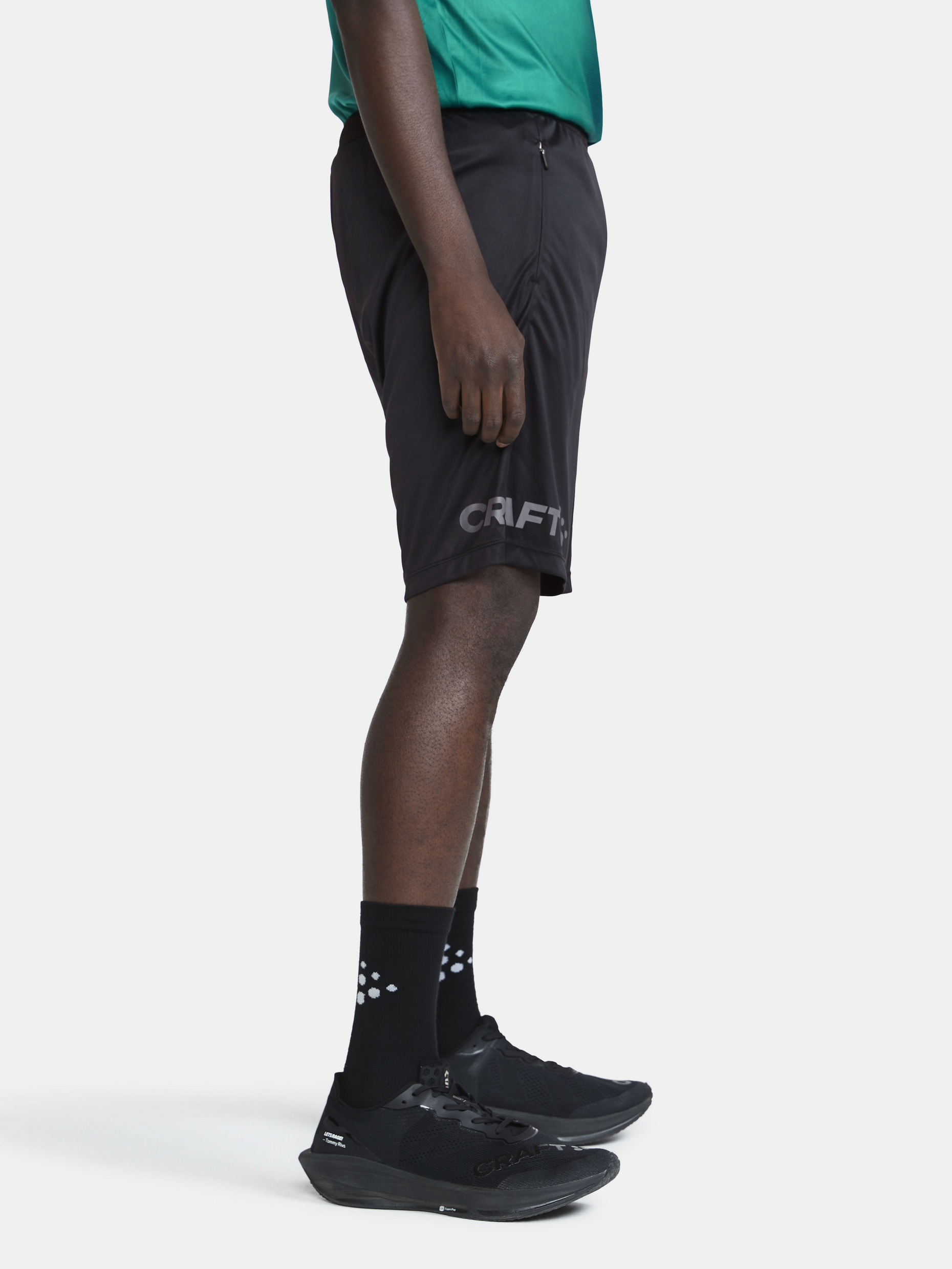 Evolve Zip Pocket Shorts M | Black | Craft Sportswear