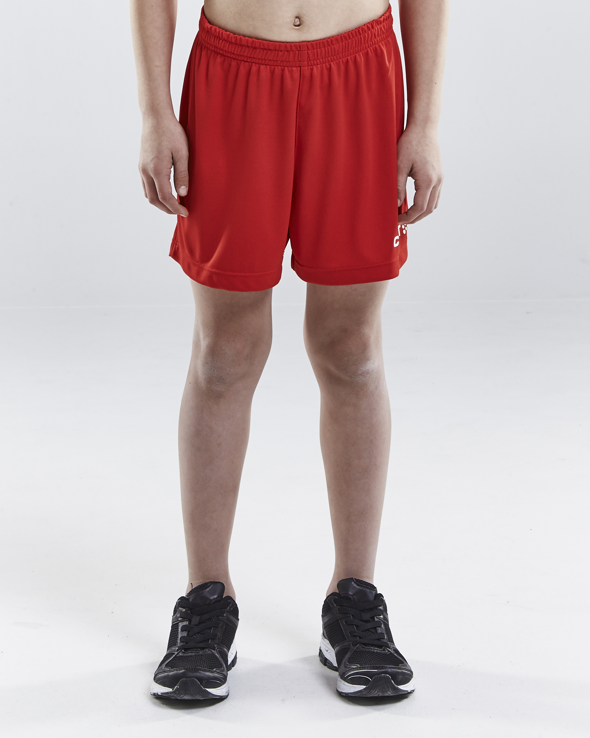 CRAFT - Trainingsbroeken - Junior - 134/140 - Rood - Squad Short Solid JR